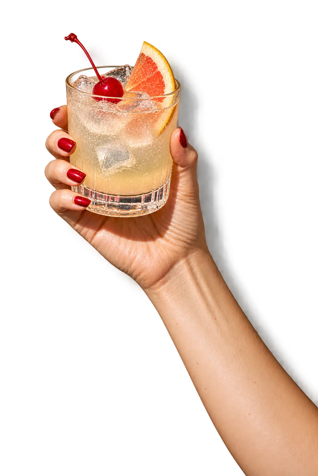 Alpine x Paloma served over ice with a fresh grapefruit garnish